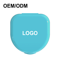 Étui de retenue de prothèse dentaire orthodontique de qualité supérieure OEM avec étui de rangement en plastique pour le nettoyage des accolades