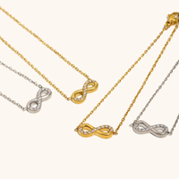 Ensemble collier et bracelet pour femme, style européen et américain, avec pendentif en forme de 8 orné de diamants, en acier inoxydable plaqué or 18 carats, design simple