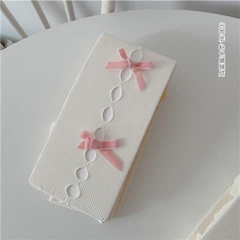 Apricot base with pink bow