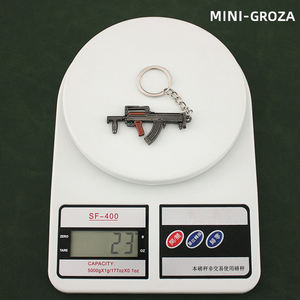 गर्म थोक मिनी बंदूक कीचेन 5-9 सेमी 18 मी 24 धातु खेल बंदूक मॉडल कुंजी श्रृंखला बंदूक खिलौना छात्र कुंजी श्रृंखला - Product Image 5