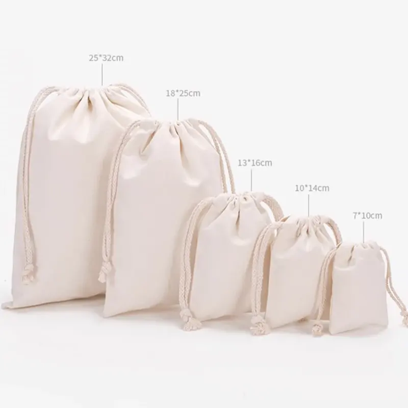 Vente en gros de petits sacs colorés personnalisés en coton sac d'emballage cadeau en toile écologique et réutilisable avec cordon de serrage