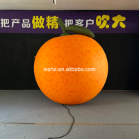 Modèle de tranche d'orange géante gonflable, ballon publicitaire personnalisé en forme de fruit des agrumes pour la promotion de bars à jus et les événements.