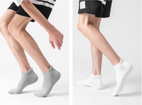 Chaussettes de sport en gros pour hommes, montantes jusqu'au genou, épaisses, élastiques, à compression, en coton et élasthanne, noires, pour la course en extérieur et le volleyball
