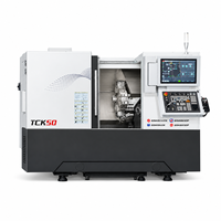 Tour CNC TCK50 avec robot portique à chargement automatique pour la production en série