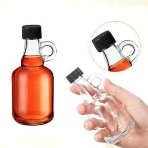 Botellas de jarabe de vidrio 3,4 oz Mini botella de jarabe de arce vacía con asa de bucle, recipientes de tarro de jarabe de arce de vidrio transparente reutilizables <span class=keywords><strong>100ml</strong></span> - Product Image 2
