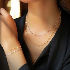 สร้อยคอรูปดอกพลัมเล็กๆ ชุบทองคำ 18K ยี่ห้อซินฟลาย และกำไลข้อมือรูปดาว AU750 สไตล์ทันสมัยสำหรับวันครบรอบ - Product Image 1