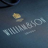 Sac de luxe en papier couché personnalisé avec estampage à chaud, logo en feuille d'or et d'argent, idéal pour événements VIP et vêtements
