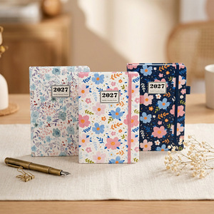 Agenda Settimanale Annuale 2027 A5 in Inglese con Quaderno a Spirale e Pianificatore Orario - Product Image 1