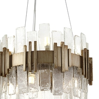 Luminaire Jingshi à anneau lumineux doré avec tubes en verre, panneaux texturés densément disposés en cercle, éclairage d'ambiance chaleureux pour la maison