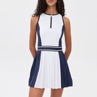 Großhandel Damen Kontrast-Farben Plissiertes Tenniskleid Hochelastisches Spandex-Polyester Atmungsaktive Outdoor-Sportbekleidung