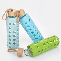 Bouteille d'eau en verre portable sans BPA personnalisée avec manchon en silicone et couvercle en bambou naturel, bouteille à boisson anti-fuite pour l'extérieur