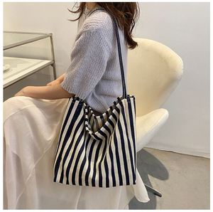 Nouveau produit : Sac à bandoulière rayé simple et frais, sac fourre-tout décontracté en toile grande capacité pour le shopping et les voyages - Product Image 5