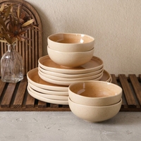 Service de table en céramique EKA, 12 pièces, glaçure réactive, design artisanal moderne, assiettes et bols mouchetés orange, compatible lave-vaisselle