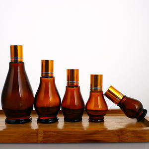 Bouteilles d'huile <span class=keywords><strong>de</strong></span> <span class=keywords><strong>parfum</strong></span> ambre en forme <span class=keywords><strong>de</strong></span> goutte d'<span class=keywords><strong>eau</strong></span> <span class=keywords><strong>de</strong></span> 10ml 20ml 30ml 50ml 100ml avec boîte vente en gros - Product Image 2