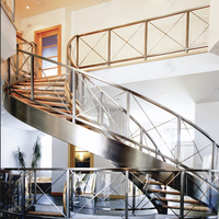 Escaliers Courbes de Style Luxe avec Garde-Corps en Verre Trempé Escaliers Courbes de Style Minimaliste pour Bâtiments Résidentiels