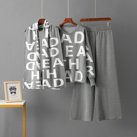 Ensemble de vêtements pour femmes en gros, boutique, 2026, ensemble de chandail en tricot jacquard à lettres en deux pièces avec écharpe, pantalon large