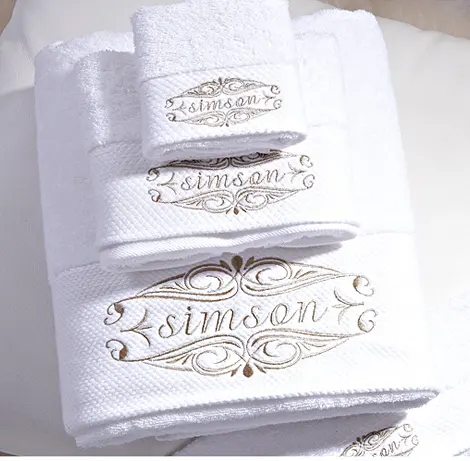 White cotton hotel face towel with embroidery