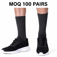 Chaussettes de basketball professionnelles OEM personnalisées pour jeunes, grandes tailles, antidérapantes, noires et blanches, en polyester, pour hommes, collection automne, vente chaude