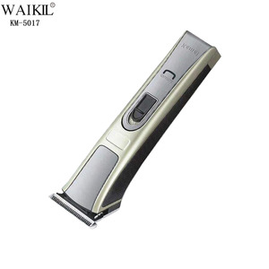Máquina Cortapelos Eléctrica Recargable USB KM-5017 de Acero Inoxidable de Alta Potencia para Hombre y Bebé, Silenciosa y Segura - Product Image 1