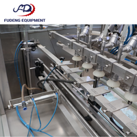 Machine de remplissage linéaire entièrement automatique d'occasion en acier inoxydable pour bouteilles, idéale pour l'huile comestible et les jus – Équipement de mise en bouteille quotidien