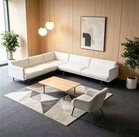 Ensemble de canapés de bureau contemporains et modernes avec panneaux en bois couleur bois naturel et pieds en fer pour bureau et salon