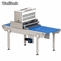 Équipement de boulangerie en acier inoxydable à ultrasons 220V Machine de découpe automatique de rouleau de gâteau pour les barres de bonbons de pain grillé pour les restaurants