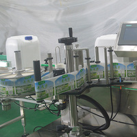Ligne de traitement d'emballage automatique de haute qualité pour le remplissage, le bouchage et l'étiquetage des barils et bouteilles d'huile alimentaire, haute sécurité