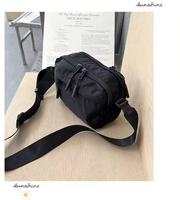 Sac bandoulière populaire en tissu nylon grande capacité pour hommes et femmes, idéal pour les trajets quotidiens, simple et décontracté