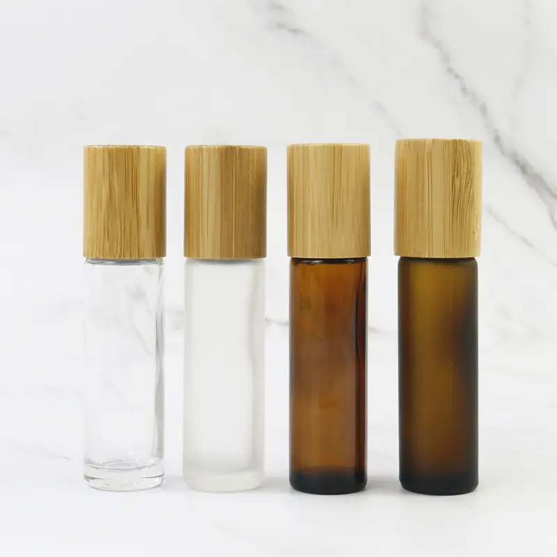 Rollo de vidrio recargable de 10ml en botella con tapa de bambú para perfume de aceites esenciales con bola de rodillo de acero inoxidable