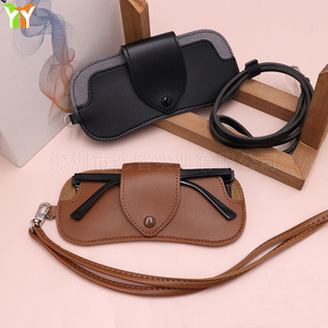 Estuche moderno para gafas de sol estilo urbano, funda protectora con cordón para gafas de sol, estuche con correa para el cuello a juego. - Product Image 1