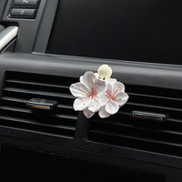 Diffuseur d'arômes pour la climatisation de voiture ; Diffuseur d'arômes pour voiture ; Diffuseur d'arômes décoratif en plâtre en forme de pivoine