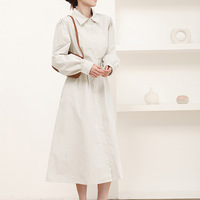 Robe longue élégante pour femme à manches longues boutonnée, col chemise, manches bouffantes, coupe trapèze ample, idéale pour le bureau en automne
