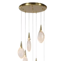 Suspension Jingshi Lighting Goutte d'Or, abat-jour en forme de larme blanc laiteux sur fils fins, luminaire de plafond pour la maison à l'éclat chaleureux