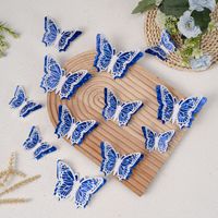 Grenzüberschreitende 3D-Schmetterlings-Wandaufkleber aus Perlmuttpapier, 12-teiliges Set (4 große, 4 mittelgroße, 4 kleine), ausgehöhlt, lasergeschnitten, silberkantig