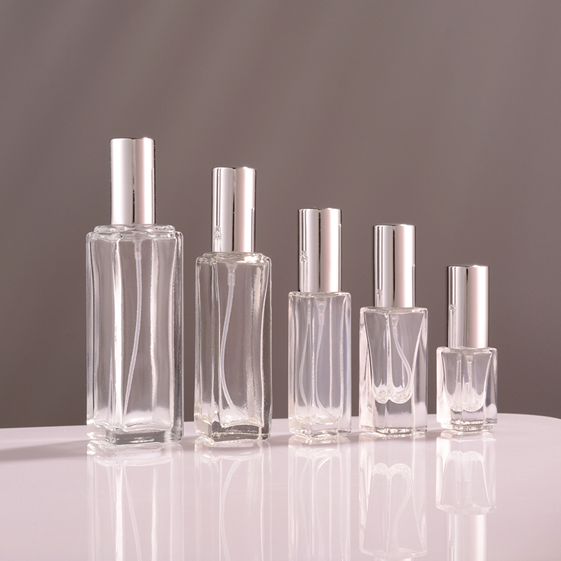 Transparent bottle with silver cap
