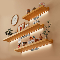 Étagères murales flottantes en bois massif personnalisables avec éclairage LED intégré pour la décoration de la maison et du bureau