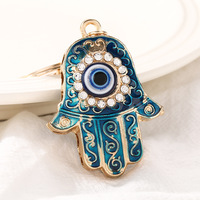 Pendentif porte-clés Mains de Fatma en alliage européen et américain, accessoire de bijouterie œil bleu turc contre le mauvais œil