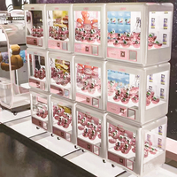 2025 Usine Directe Mini Poupée Machine À Monnaie Multi-Fonction Boîte Magique Griffe Clip Jouet et Bonbons Cadeau Griffe Machine