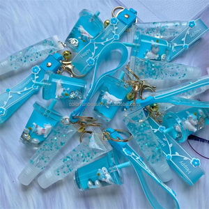 LLavero de acrílico líquido con Base de brillo de labios para niños, cadena para llaves, cosméticos, Pintalabios con pompón, venta al por mayor - Product Image 4