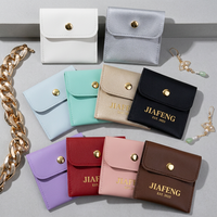 Pochette à bijoux en cuir PU de qualité supérieure avec bouton pression doré pour collier, bague et boucles d'oreilles, emballage personnalisé avec logo, sac cadeau