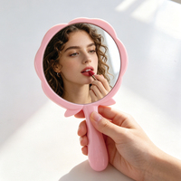 Miroir en forme de rose Un miroir miniature mignon et portable pour filles Parfait pour les voyages ou l'usage quotidien Un miroir de maquillage compact et élégant.