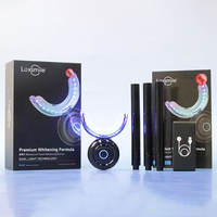Kit de blanchiment dentaire Luxsmile personnalisé professionnel avec logo privé, stylo gel blanchissant sans fil pour usage domestique, 32 LED lumière rouge et bleue