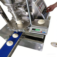 Machine automatique Momo pour le moulage de kubba, la fabrication de mooncakes, de mochi, de khinkali, de maamoul et de pains fourrés cuits à la vapeur