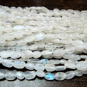 Perles de pierre de lune arc-en-ciel naturelles blanches et bleues chatoyantes de 4 mm - Product Image 1