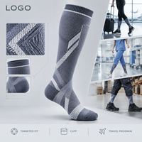 Chaussettes de compression sportives gris anthracite à compression graduée pour mollets, avec tableau de mesure, manchette plus large et bout plat