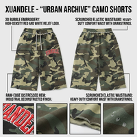 Shorts en jean baggy pour hommes, style streetwear, effet délavé vintage, camouflage, en molleton bouclette, avec ourlet brut et broderie de lettres, vente en gros