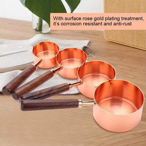 Juego <span class=keywords><strong>de</strong></span> 4 Tazas Medidoras <span class=keywords><strong>de</strong></span> Acero Inoxidable con Baño <span class=keywords><strong>de</strong></span> Oro Rosa y Cobre, con Mango <span class=keywords><strong>de</strong></span> Nogal, un Éxito <span class=keywords><strong>de</strong></span> Ventas para su Cocina. - Product Image 1
