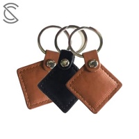 Porte-clés en cuir NFC F08 13,56 MHz personnalisé en gros, étiquette programmable ISO 1443A RFID, carte de visite étanche