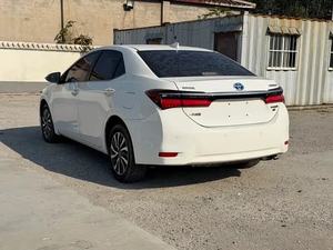 Voiture d'occasion <span class=keywords><strong>hybride</strong></span> <span class=keywords><strong>Corolla</strong></span> E-CVT à double moteur automatique, énergie nouvelle, conduite à gauche, intérieur foncé, en promotion - Product Image 5