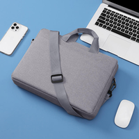 Nouvelle mode 2026 : Housse de protection rigide en EVA pour ordinateur portable, personnalisée en usine, avec bandoulière et poignée